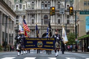 Philadelphia Police and Fire drum corp march in the Veterans Day parade