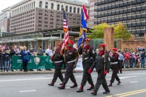Veterans march in the veterans day parade