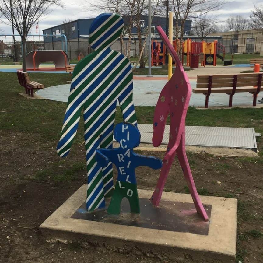 Colorful Metal abstract sculptures of a family at Picariello Playground
