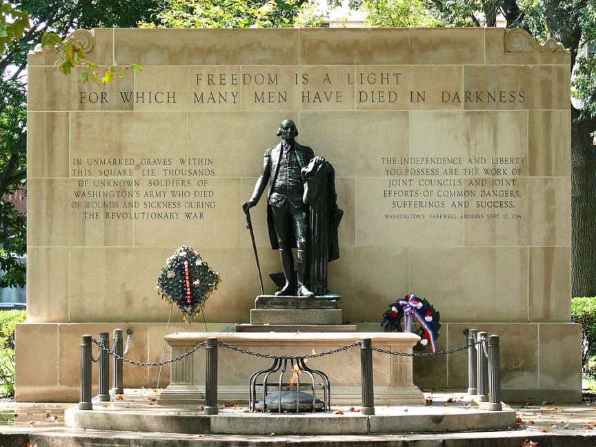 Tomb of the unknown revolutionary war soldier. Bronze statue of George Washington.